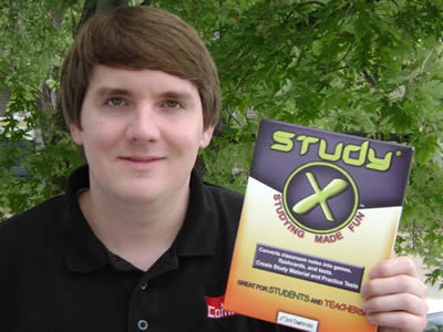 StudyX creator holding a copy of the study software